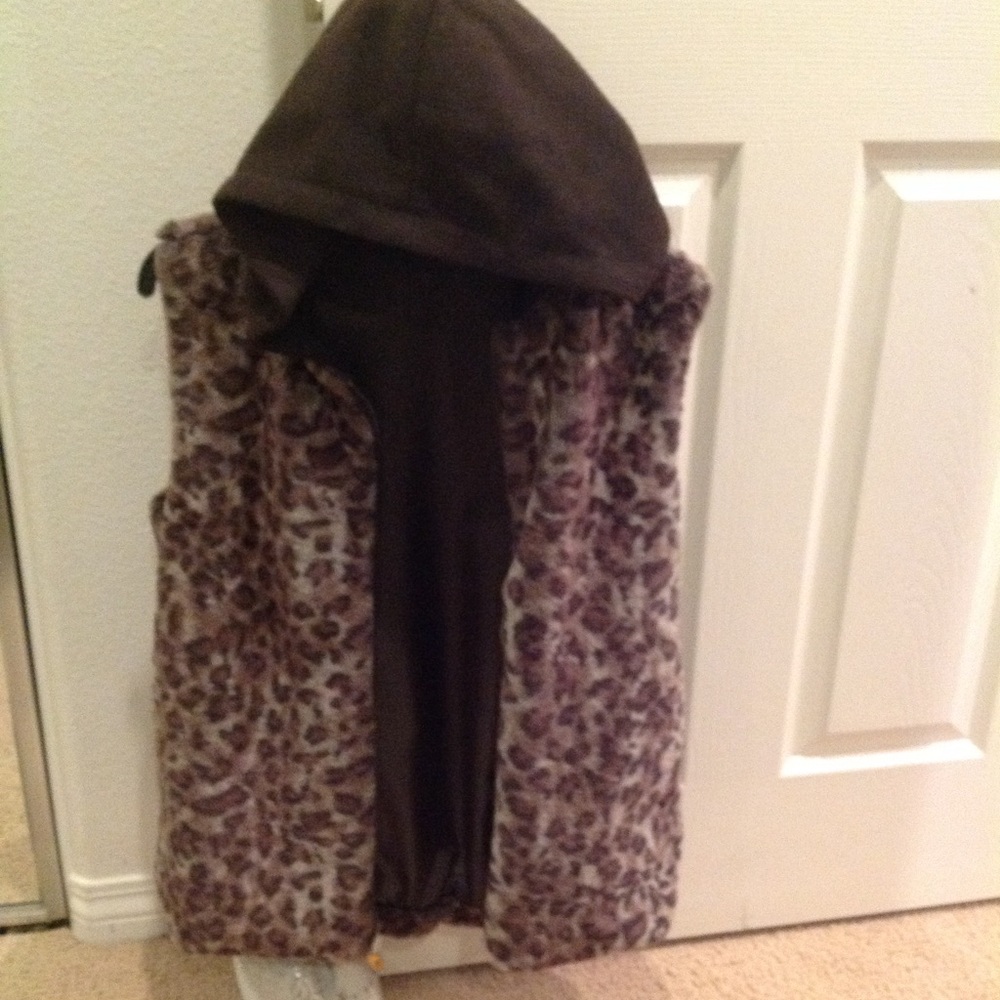 New Vest with hoodie ( never worn)